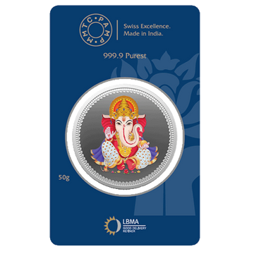 Silver coin with Ganesh design on a blue card with certification logos