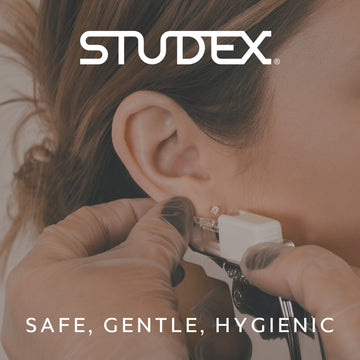 Person getting an earring put in with Studex branding and product features.